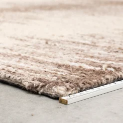 Beige vloerkleed van wol - Dutchbone Rhea