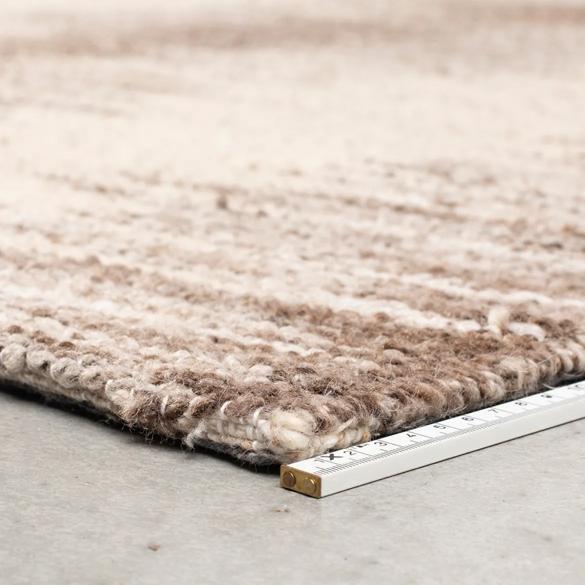 Beige vloerkleed van wol - Dutchbone Rhea